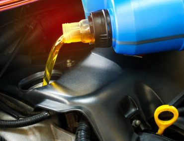 refueling-pouring-oil-quality-into-engine-motor-car-transmission-maintenance-gear